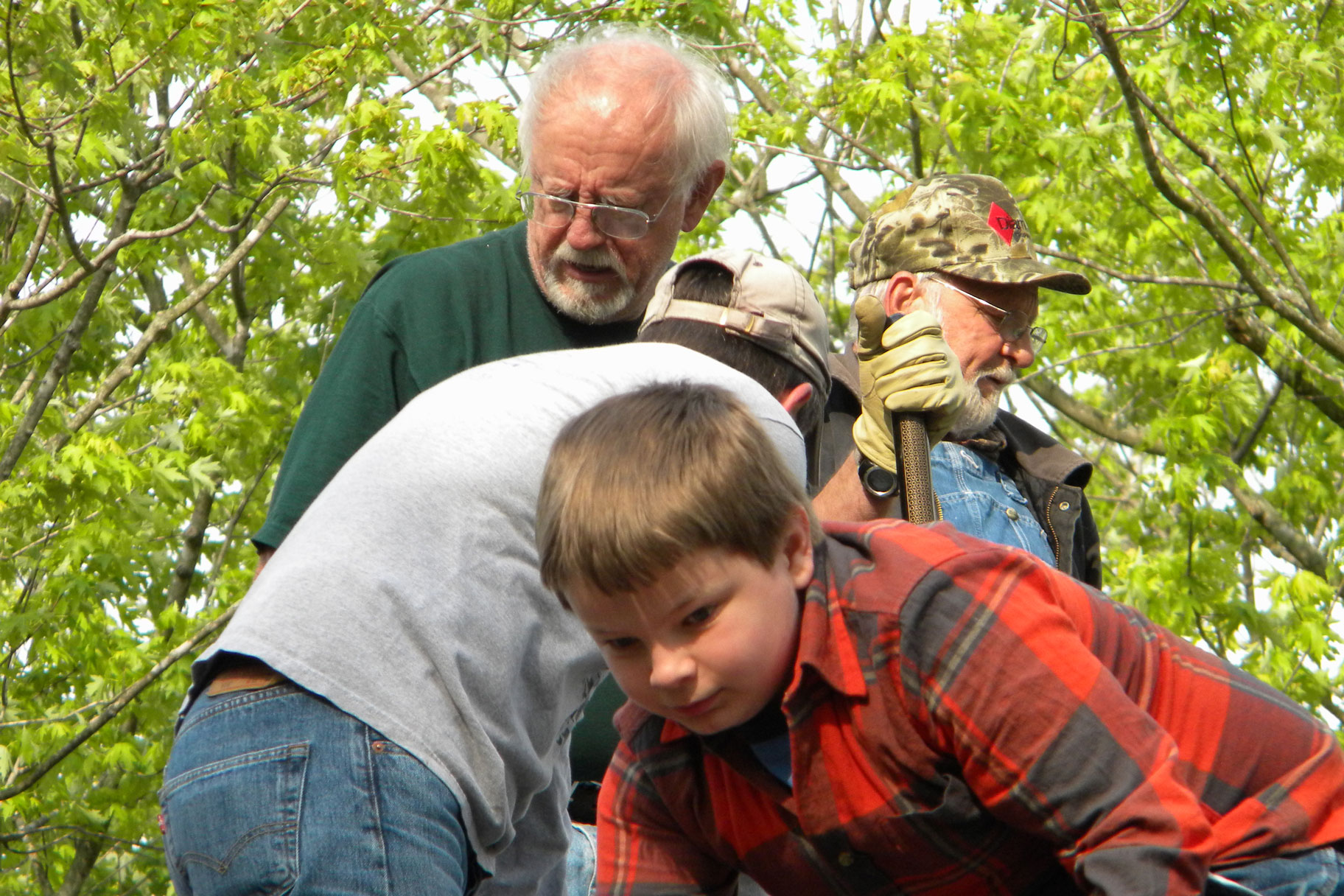 A team of all ages works together.
