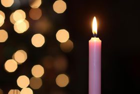 The third Sunday in Advent sees the lighting of the pink or rose candle. Photo by Kathleen Barry, United Methodist Communications.