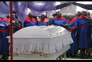Women gather near the casket of United Methodist Bishop Abel T. Muzorewa in Mutare, Zimbabwe, in May of 2010. Some 5,000 people attended Bishop Muzorewa's funeral. Photo by Tafadzwa Mudambanuki, UM News.