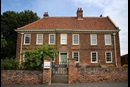 The Old Rectory in Epworth, England was built in 1709 following the "Great Fire" and was the home of John and Charles Wesley along with their parents and siblings. Photo by Kathleen Barry, United Methodist Communications.