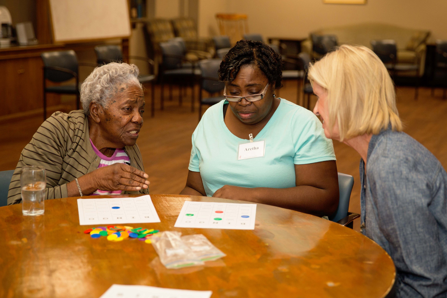 Respite Ministry volunteers play bingo together. 