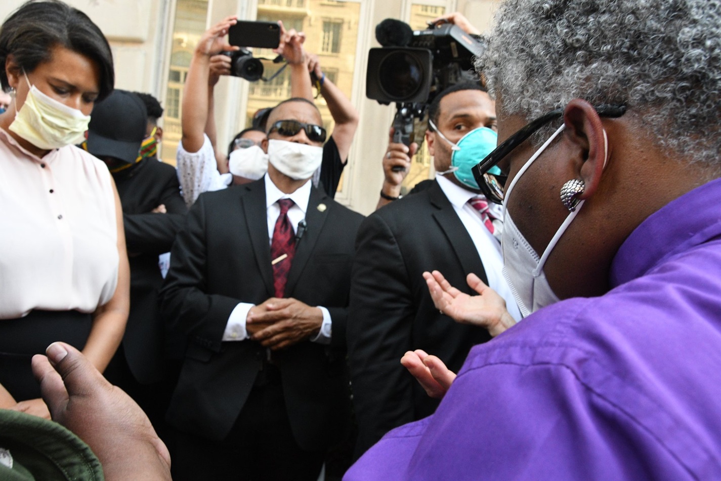 United Methodist Bishop LaTrelle Easterling (right) offers a prayer during an interfaith vigil near the White House in Washington Wednesday, June 3, 2020. Photo by Melissa Lauber, Baltimore-Washington Conference.