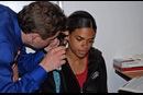 Dr. Jeff Thill, a volunteer at a Shepherd's Hope Health Center in Orlando, Fla., examines patient Geannie Figuereo. The clinic, founded 10 years ago by St. Luke's United Methodist Church, serves residents without access to insurance or medical care. 