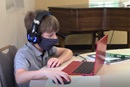 Neighborhood children attend a virtual school learning pod at Denton's Chapel UMC in Nashville, Tennessee