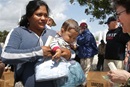 United Methodist bishops help families during an immersion experience at the U.S. / Mexico border. Photo by Kathleen Barry, UMNS