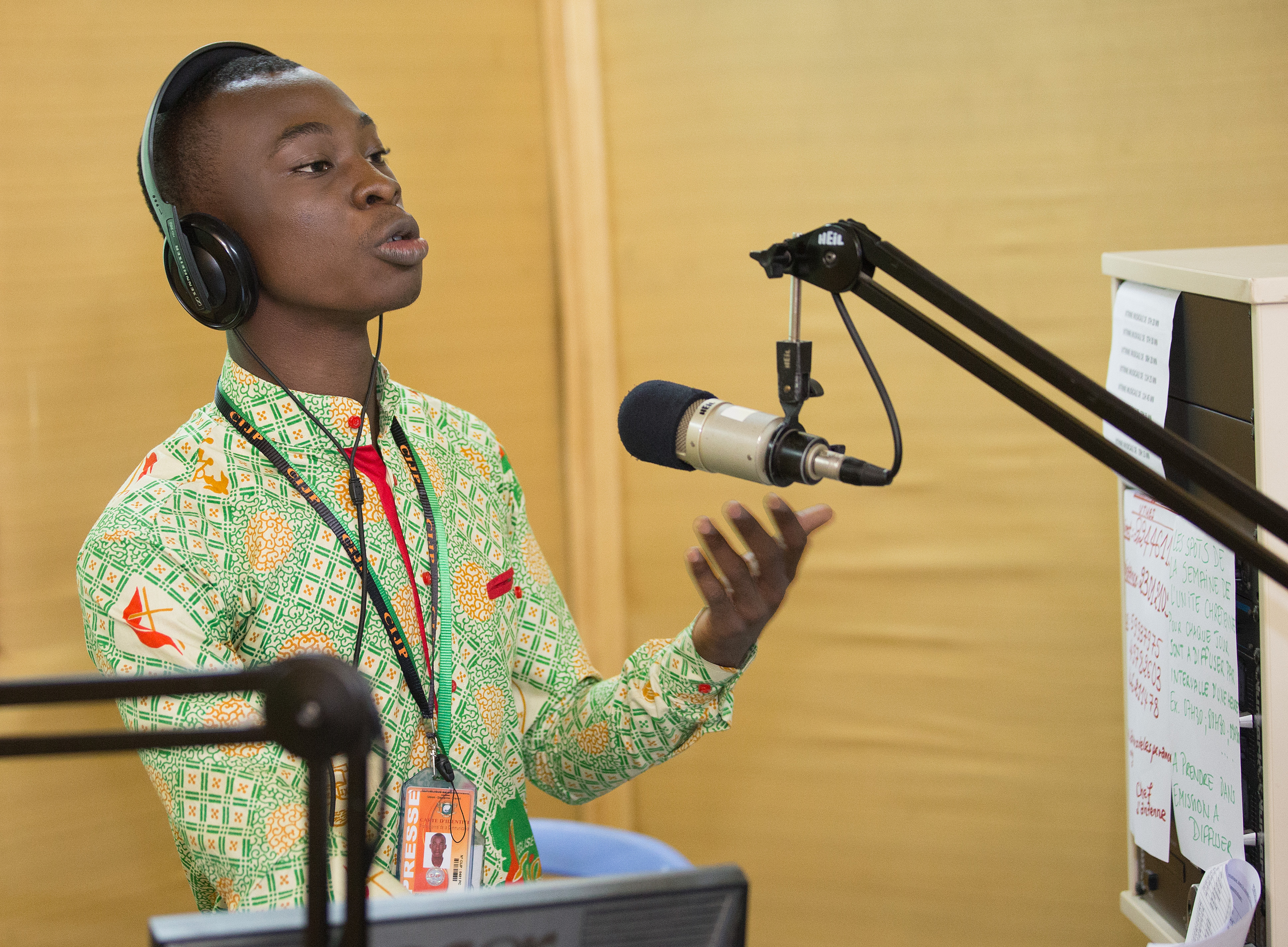 Lionel Sahuie broadcasts from The United Methodist Church's Voice of Hope radio station in Abidjan, Côte d'Ivoire. Photo by Mike DuBose, UMNS.