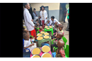 Children receive a porridge meal at Mangobo Methodist Hospital Center in Kisangani, Congo, while staff monitor them. In 2023, The United Methodist Church cared for more than 2,300 malnourished children in the region, include 771 with acute malnutrition. Photo courtesy of the Health Department of The United Methodist Church in Eastern Congo.