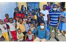 Innocent Afful, a missionary with the United Methodist Board of Global Ministries, poses with children from a church-supported orphanage in Kinshasa, Congo. Funding from a Global Ministries Advance project teaches orphans vocational skills. Photo courtesy of Innocent Afful.