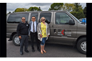 Angel (right) and Lourdes (left) Franco stand beside Rev. Dr. Woojae Im (center), their district superintendent. Im was their connection to the Korean church that donated funds for the van.