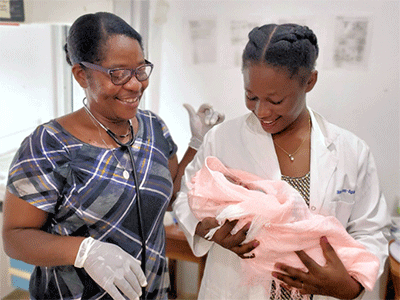 The mother and daughter team is at work at HAPI’s Start Right Clinic in Mizak. Yoland Gabriel Zephir (left) came to HAPI as an artisan in 2007. She now serves as HAPI’s Director of Community Health. Yoland’s daughter, Dr. Riouse Zephir, has returned to HAPI as their first medical resident and female physician. ~ photo courtesy Haitian
