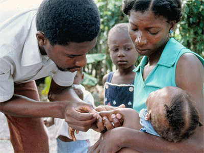Grace has a small inpatient hospital in Port-au-Prince. However, much of their medical ministry is done in 150 outposts reached by a medic on a moped. “That can be as simple as a folding table set up underneath a nice shade tree,” according to Len Middleton. ~ photo by Keith Mumma, courtesy International Child Care