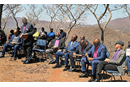 Retired Bishop David Yemba of Central Congo (standing) leads fellow bishops in a time of prayer and reflection on a mountain overlooking Africa University in Mutare, Zimbabwe. The Africa Colleges of Bishops held its annual retreat Sept. 2-5 at the United Methodist university. Photo by Eveline Chikwanah, UM News.