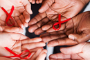 AIDS awareness ribbons (Photo: Getty Images / Canva Pro)