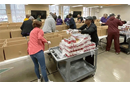 Volunteers prepare boxes for the 2024 Thanksgiving distribution to families needing assistance with the Thanksgiving feast. (Photo: Courtesy of Hope UMC)
