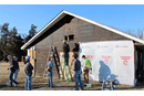  “Yep – there be birds in there.” Kansas State University students get to work on the siding project for Kulli Tuklo UMC in Idabel, Oklahoma. Photo: Courtesy of Oklahoma Indian Missionary Conference
