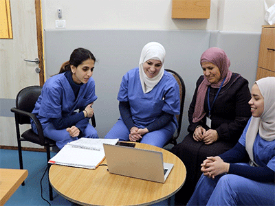 Members of the Princess Basma Centre multi-disciplinary team, based in the Child Rehabilitation Center in Jerusalem, during a Telemedicine session with a family and child with disabilities. (Photo: Princess Basma Centre)